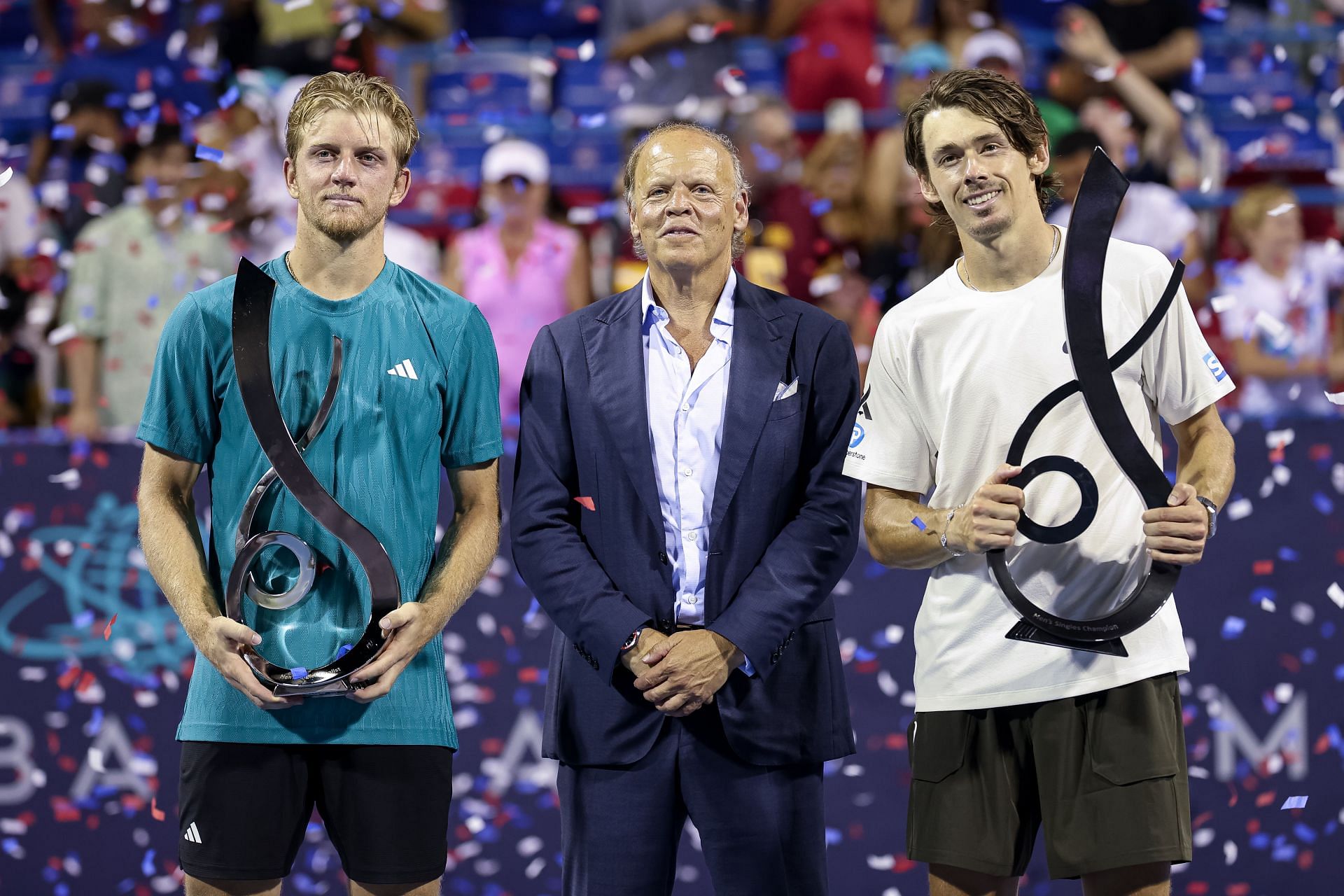 From left to right: Alejandro Davidovich Fokina, tournament director Mark Ein and Alex de Minaur during the men's singles trophy presentation ceremony at the 2025 Mubadala Citi DC Open (Source: Getty)